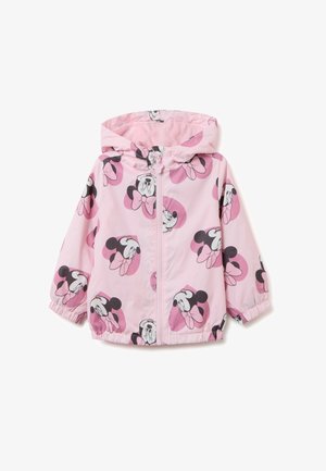 Giacca a vento per bambini di colore rosa con cappuccio e zip, stampata con volti ripetuti di Minnie Mouse che indossano fiocchi all'interno di cuori rosa.