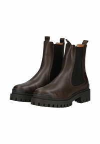 Hnědé kožené chelsea boty s elastickými bočními panely, kulatou špičkou a silnou černou gumovou podrážkou se zdrsněným vzorem.