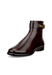 Braune Lederstiefelette mit glatter Oberfläche, abgerundeter Spitze und einem Riemen mit goldenen Akzenten um den Knöchel. Flache Sohle, elegantes Design.