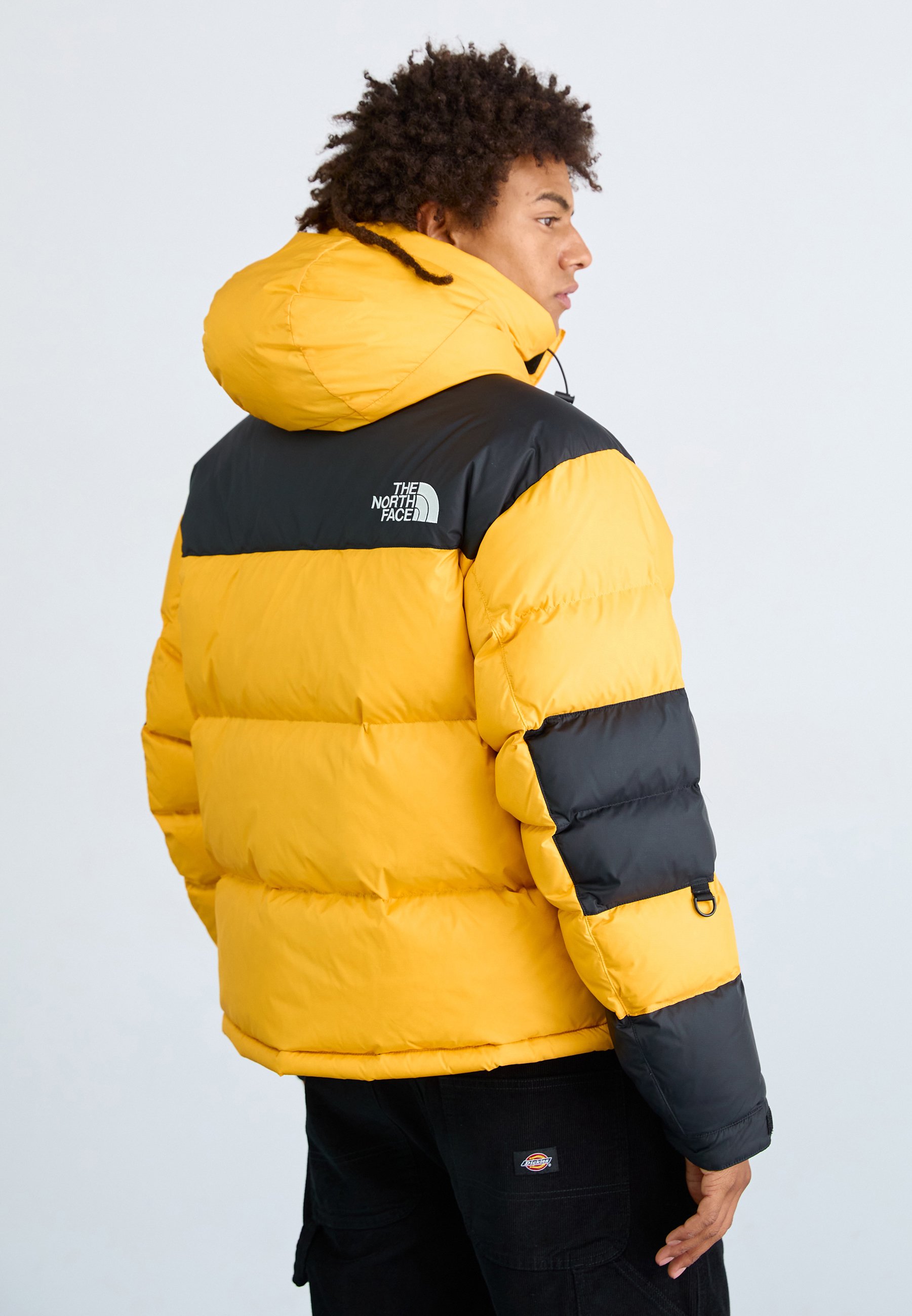 The North Face M HMLYN BALTORO JACKET - Down jacket - summit gold