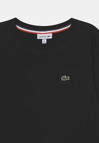 Lacoste Langarmshirt - black