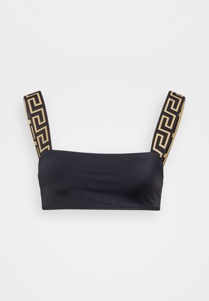 Black bandeau top with smooth fabric, featuring wide straps adorned with a geometric gold pattern. Simple, seamless design.