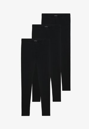 Leggings noirs en tissu extensible, avec une finition lisse et une ceinture élastique. Trois paires disposées verticalement.