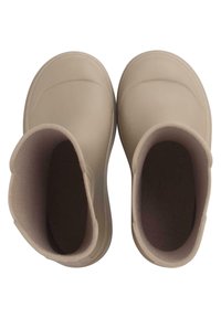 Bottes chevilles beige clair avec un extérieur lisse, un bout arrondi et une doublure texturée. Conçues pour le confort et la facilité d'enfilage.