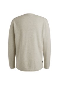 Light gray long-sleeve shirt with a rounded neckline, made from a soft, textured fabric. Features a straight hem and a subtle logo tag at the side.