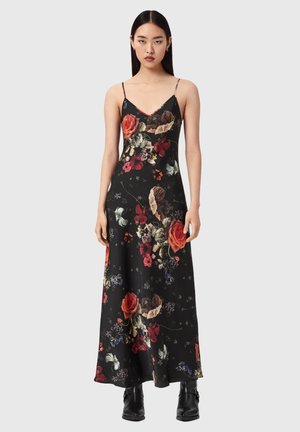 Čierne maxi šaty s tenkými ramienkami, zdobené kvetinovým vzorom v červenej, bielej a fialovej farbe. Vyrobené z hladkej látky so priliehavým strihom.