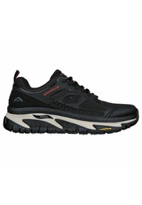 Schwarze Sportschuhe mit einer strukturierten Oberfläche, wasserabweisendem Label, gepolsteter Sohle und einem gut sichtbaren "ArchFit"-Logo an der Seite.