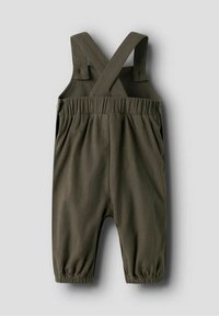 Tutina in cotone verde scuro con bretelle incrociate, vita elasticizzata e polsini arricciati alle caviglie. Tessuto liscio e vestibilità comoda e morbida.