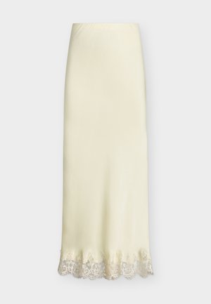 Φούστα από σατέν σε κρεμ χρώμα με δαντέλα στο τελείωμα, ίσια γραμμή και ψηλή μέση σε μονόχρωμο φόντο.