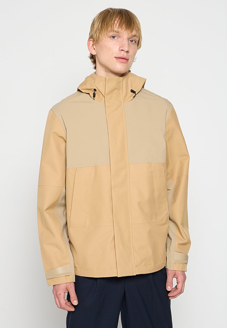 Tommy Hilfiger Regenjas zandkleur Tommy Hilfiger Regenjas zandkleur