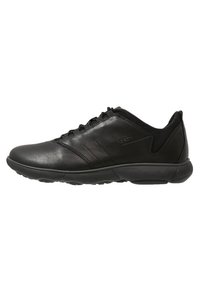 Black leather sneakers with a smooth finish, mesh accents, round toe, and a flexible rubber sole. Features subtle stripes on the side.