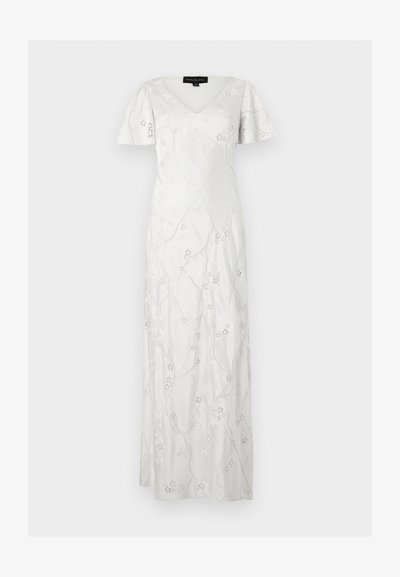 Λευκό μακρύ φόρεμα με κοντά φουσκωτά μανίκια, ντεκολτέ σε σχήμα V και λεπτή λουλουδάτη κεντητική σε όλο το ύφασμα.