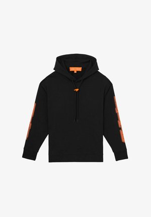 Black hoodie with long sleeves, featuring orange branding on the left arm, drawstring hood, and soft texture. Simple, modern design.
