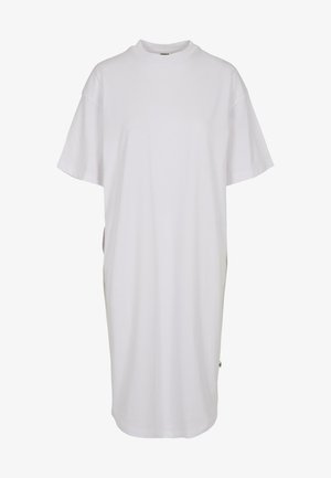 Vestido t-shirt oversize de algodón blanco con mangas cortas, escote redondo y aberturas laterales, que presenta un pequeño acento verde en el dobladillo.