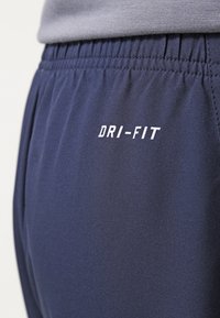 Nike Performance Kalhoty - blue