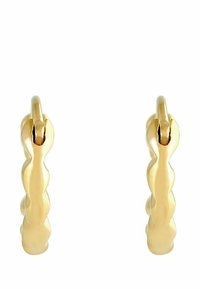 Boucles d'oreilles créoles dorées avec un design lisse et arrondi et une texture ondulée sur le bord extérieur.