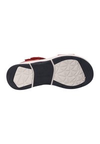 Rote und weiße Sneaker-Sohle mit einem strukturierten schwarzen Gummiboden. Verfügt über Diamantmuster und geprägte Markenkennzeichnung.