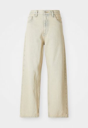 Jasno beżowe dżinsy o szerokich nogawkach, z przednimi kieszeniami, wysokim stanem i subtelnymi detalami przeszycia. Wykonane z teksturowanej tkaniny dżinsowej.