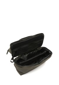 Borsa da toeletta in tela di colore verde scuro, con zip nella parte superiore, tasca in rete e due scomparti interni per un'organizzazione ottimale. Texture liscia.