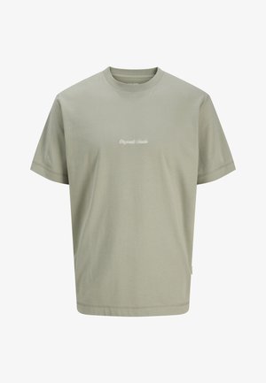 Lichtgroen katoenen T-shirt met korte mouwen, een ronde hals en een kleine witte tekst "Originals Studio" gecentreerd op de borst.