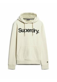Beige hooded sweatshirt with front pocket and black "Superdry." text across chest and small logo on left sleeve cuff.