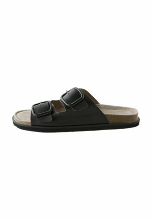 Schwarze Zehentrenner-Sandale mit zwei Riemen und verstellbaren Schnallen, Korkfußbett und Gummisohle. Glattes Leder und weiche Wildledertexturen.