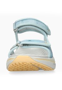 Sandale de sport bleu clair avec des bandes ajustables et une semelle beige texturée vue de face.