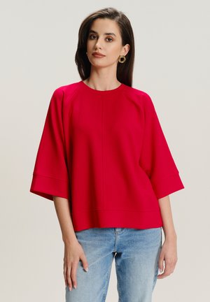- Bluza