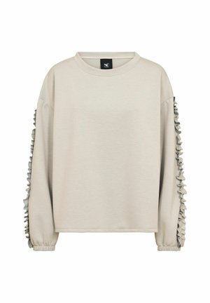 Sudadera beige de manga larga con volantes a lo largo de ambas mangas y puños elásticos.