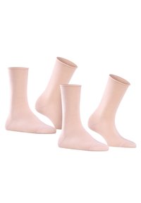 Light pink cotton socks, mid-calf length, smooth texture, reinforced toe, ribbed cuff. Four socks displayed, all identical in design.