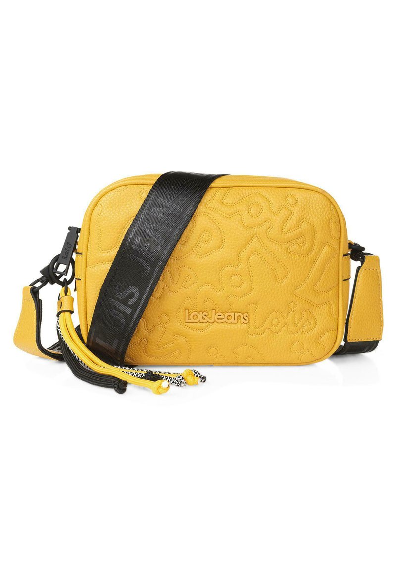 Bolso cruzado de imitación cuero amarillo con diseño embossing, correa ajustable negra y acentos de borlas. Presenta el prominente logo "Los Jeans".