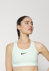 Nike Performance Sutiã desportivo - barely green/pure platinum/black