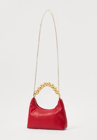 Red leather handbag with a rounded shape, featuring a gold-toned chain handle accented with circular beads. Smooth texture, zip closure.