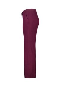 Donkerpaarse geribbelde gebreide broek met rechte pijpen, elastische tailleband en zijzakken, zichtbaar vanaf de rechterzijde.