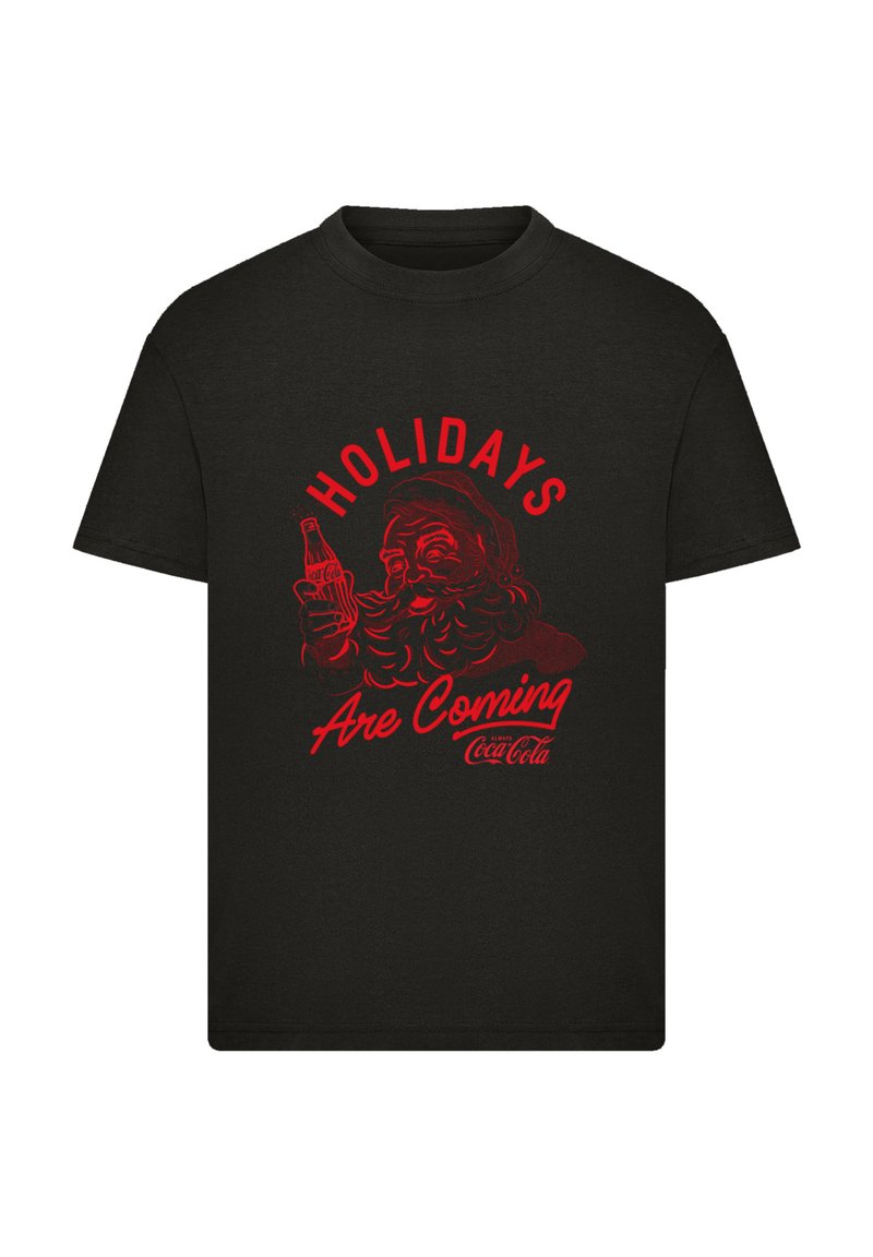 Black cotton t-shirt featuring a red graphic of Santa holding a Coca-Cola bottle with the text "Holidays Are Coming."