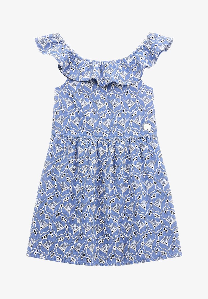 Blå blommönstrad klänning med volangkrage, ärmlös design och rynkad midja. Har vit broderi och en liten hjärtformad detalj.