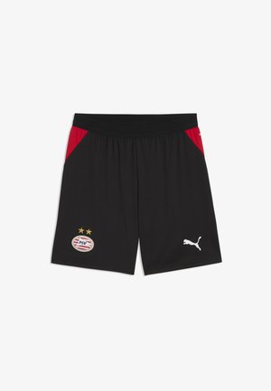 Czarne spodenki sportowe z czerwonymi panelami bocznymi, odznaka klubu piłkarskiego PSV z dwiema gwiazdkami na lewej nodze oraz biały logo Puma na prawej nodze.