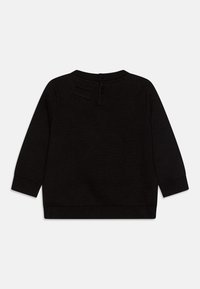 Czarny sweter z długim rękawem, okrągłym dekoltem, prążkowanymi mankietami i zapięciem na guziki z tyłu. Gładka tekstura z minimalnymi zdobieniami.