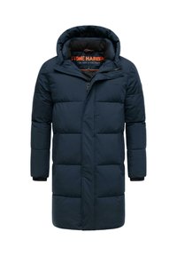 Padded navy blue parka with a hood, featuring a zippered front, elastic cuffs, and large quilted sections. Inner label in bright orange.