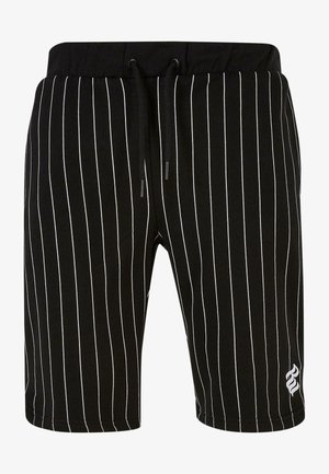 Shorts noirs avec des rayures blanches verticales, fabriqués en matériau doux, dotés d'une taille élastique avec cordon de serrage et d'un petit détail de logo.