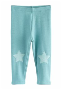 Világoskék leggings, puha anyagból, mindkét oldalon két csillag alakú applikációval, amelyek enyhén sötétebb árnyalatúak.