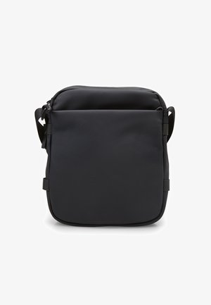 Black shoulder bag with a smooth, matte finish. Features a zip closure, adjustable strap, and minimalistic design without additional patterns.