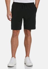 Zwarte shorts met een elastische tailleband en trekkoord. Beschikt over zijzakken en een loose fit, gemaakt van lichte stof.