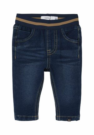 Jean bleu foncé pour tout-petit avec taille élastique featuring une bande marron, poches avant et coutures contrastées.