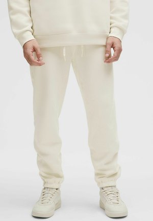 Pantalones deportivos - light ivory