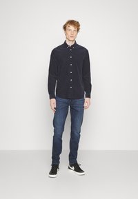 G-STAR REVEND SKINNY - Jeans Skinny Fit - worn in himalayan blue
