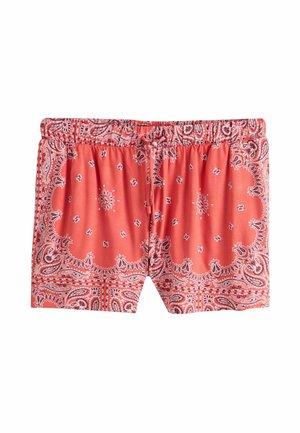 Pantaloni scurți roșii cu șnur și talie elastică, având un model de bandană paisley și floral în alb și negru.