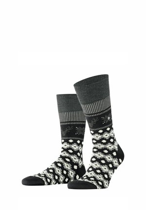 Chaussettes montantes en gris foncé, ornées de motifs horizontaux et floraux en noir et blanc, avec des bords côtelés et des orteils et talons renforcés.