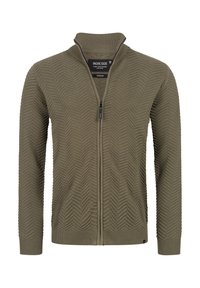 Olive green zip-up cardigan with a textured herringbone pattern, ribbed cuffs, and collar. Features a subtle branding label at the neck.