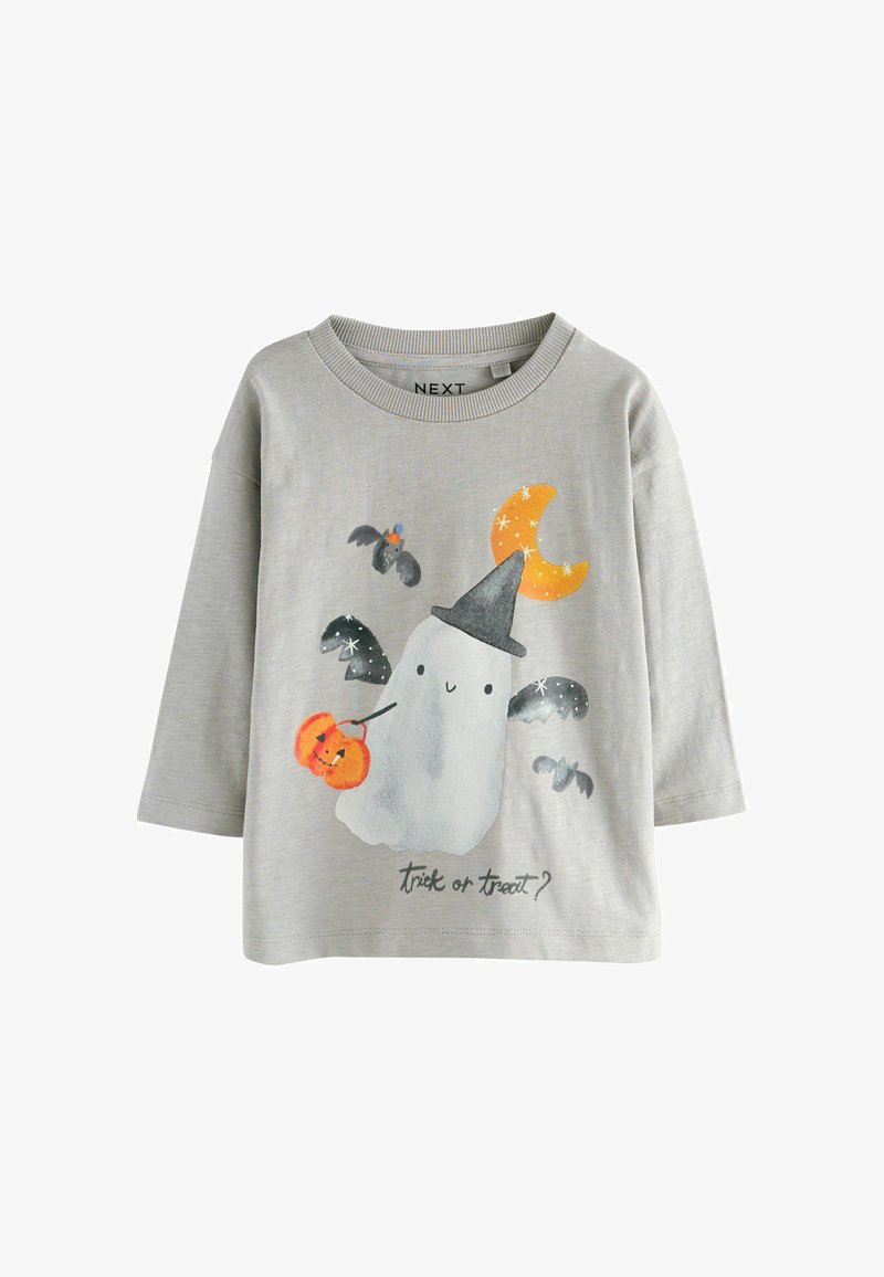 Szürke, hosszú ujjú póló, amelyen egy tököt tartó szellem grafika, denevérek és félhold található; pamut anyag, kerek nyakú kialakítás.